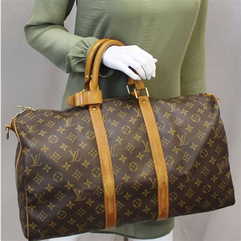 cheap louis vuitton duffle bag|louis vuitton duffle bag suitcase.